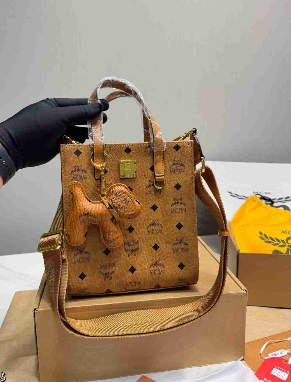 MCM Classic Cognac Mini Vertical Tote Crossbody Bag With Dog Pendant